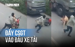Hà Nội: Điều tra vụ người đàn ông đẩy chiến sĩ CSGT vào đầu xe tải về tội giết người!