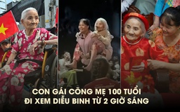 Con gái cõng mẹ 100 tuổi đi xem diễu binh: ‘Nhất định mẹ phải hưởng trọn niềm vui’