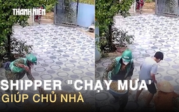 Đi giao hàng gặp trời mưa, shipper gom đậu phộng đang phơi giúp chủ nhà