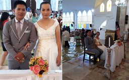 Cô dâu vượt lũ, làm đám cưới giữa nhà thờ ngập nước