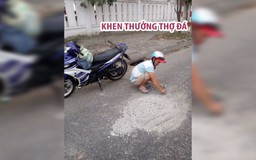 Khen thưởng thợ đá đục mảng bê tông trên mặt đường