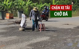 Dân mang thùng rác, ghế nhựa ra đường chặn xe chở đá