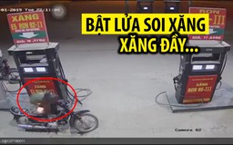 Bật lửa soi bình xăng sau khi đổ, xăng còn đầy, xe máy cháy trơ khung