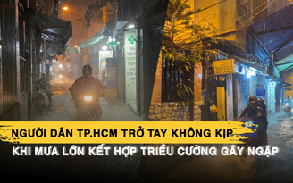 Người dân TP.HCM trở tay không kịp khi mưa lớn kết hợp triều cường gây ngập