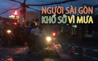Người Sài Gòn khổ sở vì mưa trái mùa