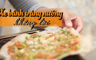 Vợ chồng điếc câm và xe bánh tráng nướng trước trường đại học Vợ chồng điếc câm và xe bánh tráng nướng trước trường đại học