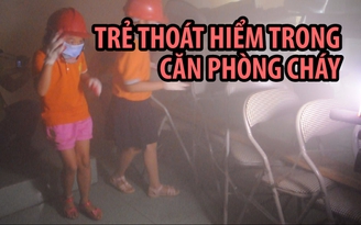 ​Trẻ thoát hiểm trong căn phòng cháy