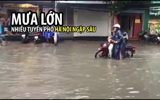 Mưa lớn khiến nhiều tuyến phố trung tâm Hà Nội ngập sâu