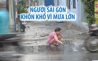 Người Sài Gòn khốn khổ trong buổi sáng trời âm u, mưa tầm tã