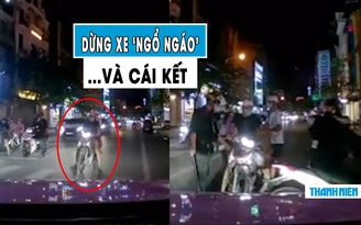 Hai thanh niên lái xe máy dừng đèn đỏ kiểu ‘thách thức’ và cái kết