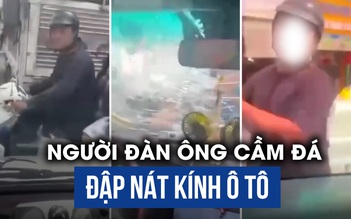 Xôn xao clip cầm đá đập nát kính ô tô ở TP.HCM