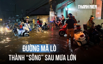 Đường Mã Lò ngập sâu sau mưa lớn, người dân chờ nước rút mới dám về nhà