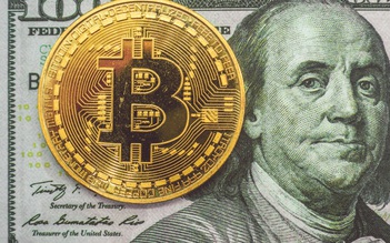 Bitcoin tăng giá kỷ lục lên gần 21.000 USD