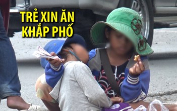 Trẻ em nói tiếng nước ngoài xin ăn khắp đường phố TP.HCM