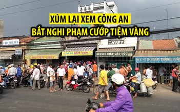 Dân xúm lại xem công an bắt nghi phạm cướp tiệm vàng bằng roi điện