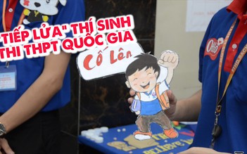 Sinh viên tình nguyện tỉ mỉ ngồi vẽ sticker “tiếp lửa” cho thí sinh thi THPT quốc gia