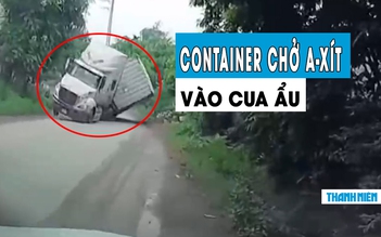 ‘Sợ tái mặt’ container chở a-xít vào cua ẩu, lật trước đầu ô tô