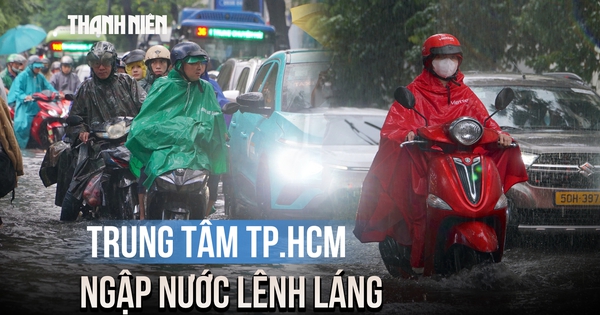Mưa lớn đầu giờ chiều, đường phố trung tâm TP.HCM ngập nước lênh láng