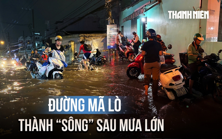 Đường Mã Lò ngập sâu sau mưa lớn, người dân chờ nước rút mới dám về nhà