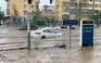 Trung Quốc đường phố thành sông, xe trôi trong lũ xiết sau bão Doksuri