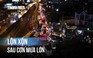 Ô tô, xe máy chen chúc sau cơn mưa lớn ở TP.HCM