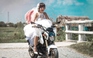 Thúy Nga lái mô tô, cướp thùng tiền cưới trong MV mới