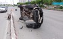 Tránh xe buýt, Mazda CX9 lật nhào trên Xa lộ Hà Nội