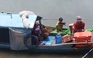 Hai gia đình Việt kiều vượt biên về Việt Nam vì nghèo quá