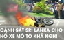 Dân chúng vây quanh xem cảnh sát Sri Lanka cho nổ xe mô tô nghi có bom