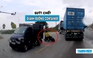 Nam thanh niên lái xe máy điện suýt chết vì ‘cả gan’ giành đường container
